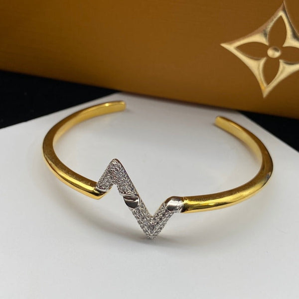 <oriell> VOLTE UPSITEN DOWN DIAMANT GOLD OFFENES ARMBAND</oriell>