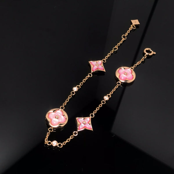 <ORIELL>STAR AND SUN 4 MOTIF PINK MOP PINK GOLD BRACELET