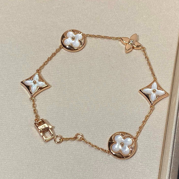 <ORIELL>STAR AND SUN 5 MOTIF MOP PINK GOLD BRACELET