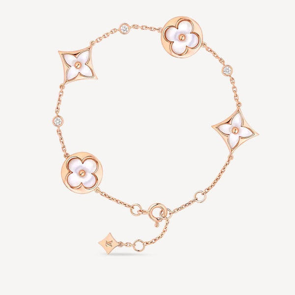<ORIELL>STAR AND SUN 4 MOTIF WHITE MOP PINK GOLD BRACELET