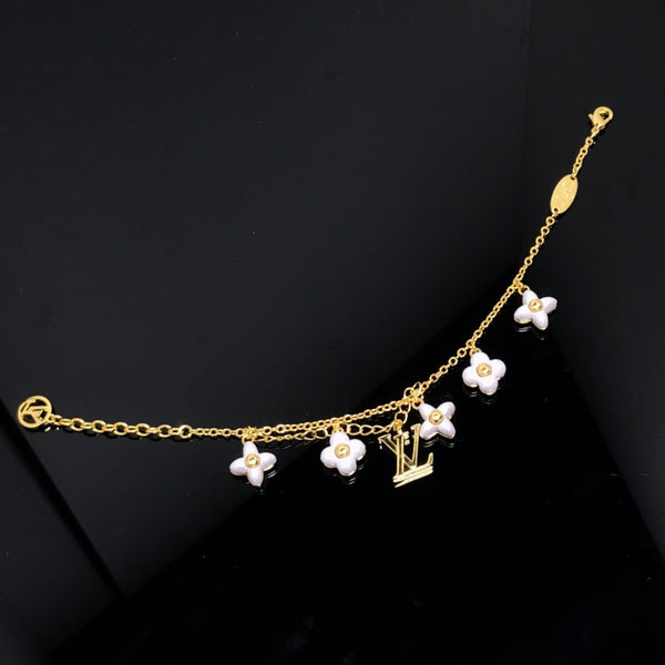 <ORIELL>LOGO 6 MOTIF STAR AND SUN GOLD BRACELET