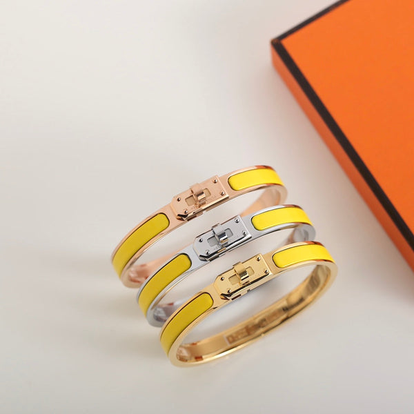 <oriell> HM KELLY GELBES ARMBAND</oriell>