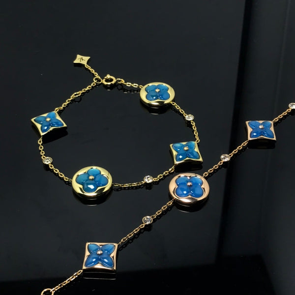 <ORIELL>STAR AND SUN 4 MOTIF BLUE BRACELET